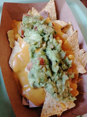 Nachos with guacamole and vegan cheese at kastami'S in Vigo