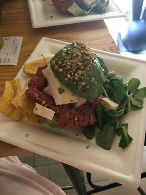 Vegan avocado burger with tofu and hummus  at Avocado Bar in Rome
