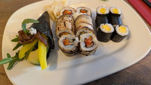 Temaki with vegetables, vegan roll with eggplant and paprika as well as Mango Maki at Sushi Haus in Cologne