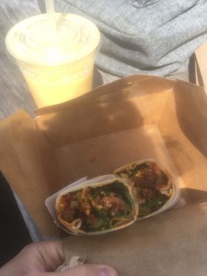 Breakfast burrito and tropical smoothie, they subbed the honey with dates!  at Lulu's Empowering Goods in Lindenhurst