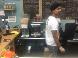 Homemade peanut butter, and see sign for organic fair trade bananas for $1.29 a pound at Lulu's Empowering Goods in Lindenhurst