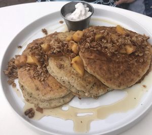 Peaches and Cream Pancakes.  at Naive in Louisville