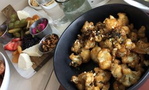 General Tso’s cabbage and Cheese Board, both vegan. at Naive in Louisville