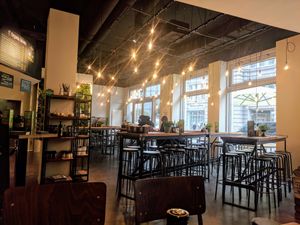 Lots large tables, great for groups. at Little Green Rabbit - Checkpoint Charlie in Berlin