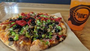 Vegan pie: broccoli, olives, red pepper, mushroom + fanta at Your Pie in Flagstaff