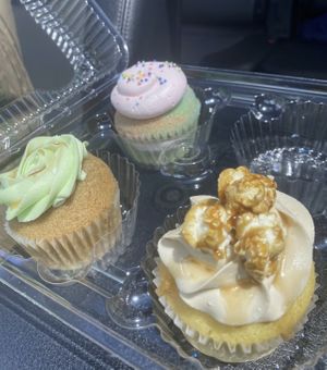 Caramel corn, caramel apple, and cotton candy cupcakes!  at The Happy Bakery in Ofallon