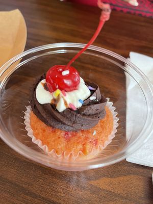 Cherry Cupcake chocolate icing   at The Happy Bakery in Ofallon