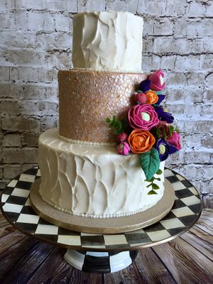 Coutoure bridal cake with sugar flowers at The Happy Bakery in Ofallon