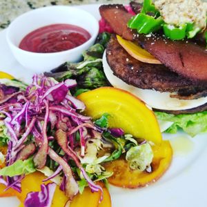 Deconstructed plant based burger with an ultimate beefless burger patty from gardein and a side of veggies. at The Bel Air Treehouse in Los Angeles