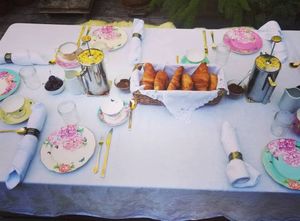 Breakfast with vegan croissants on the calm terrace. at The Bel Air Treehouse in Los Angeles