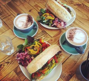 Avocado and roasted veggie baguette with a side salad and oat hot chocolate at Gaard Coffee Hide in Sheffield