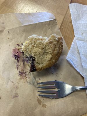 What’s left of my blueberry muffin by time remember take photo it was so good   at Culture Coffee & Tea Bar in Virginia Beach