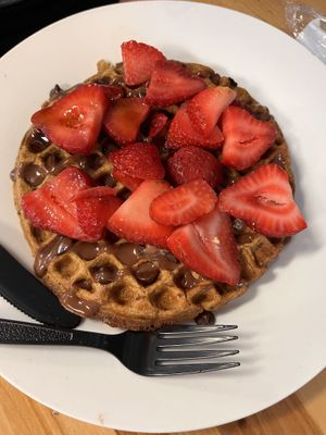 Waffle with strawberries, chocolate chips, and chocolate cream cheese drizzle   at Culture Coffee & Tea Bar in Virginia Beach