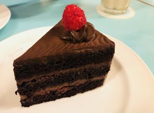 85% Dark Chocolate Cake with Raspberry and Chia Seed Compote
 at Privé - Asian Civilisation Museum  in Central Singapore