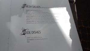 Menu: salad and side order selection at Hans im Glück in Leipzig