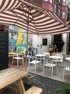 Behind the restaurant there’s a cute patio for customers. They will bring your food right out to you.   at LB Kitchen in Portland