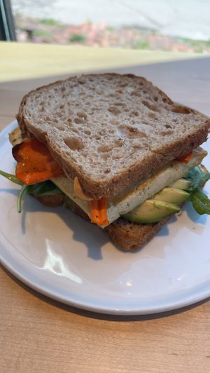 Vegan breakfast sandwich. Tofu bacon carrot thingy. Yummy sauce. I added the avocado for $3    at LB Kitchen in Portland
