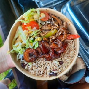 Jerk bowl: jerk oyster mushroom, onions and peppers, rice and peas, salad, plantain at Livity Plant Based Cuisine in Croydon