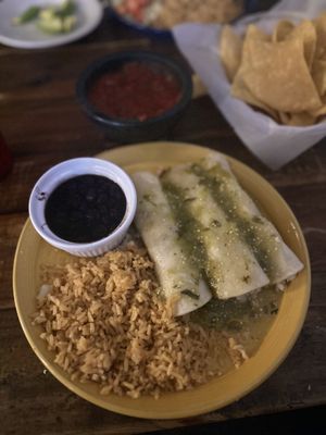 Enchiladas de papas with salsa verde and a side of rice and black beans.  at Grand Hacienda in St Pete Beach