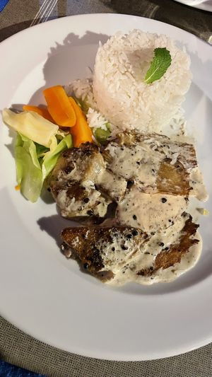 Seitan with pepper sauce. Tasty vegetables.  at Safari in Portimao