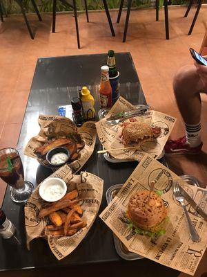 Beef and bacon burger top. Bottom vegan burger with sweet potato and normal fri at Burger Me at Wilsons in Phuket