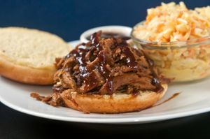 Vegan pulled BBQ sandwich on a brioche roll with a side of coleslaw at The Greener Kitchen in Baltimore