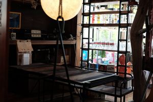 table with swinging bench at Kuma Cafe in Hachinohe