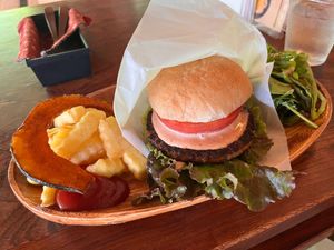 vegan burger with fries and salad at Kuma Cafe in Hachinohe