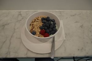 Matcha and coconut yogurt breakfast bowl at Superfood & Organic Liquids in Berlin