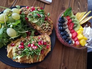 hummus avocado bread and smoothie bowl  at Panenská Kaviareň in Bratislava