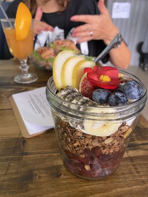 Acai bowl with delicious cinnamon homemade granola, nuts, chia seeds, fresh fruit and coconut at Panenská Kaviareň in Bratislava