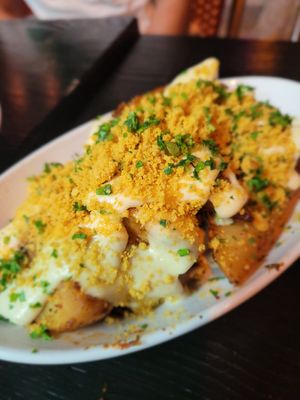 Cheesy potato wedges at Pura Vita in West Hollywood
