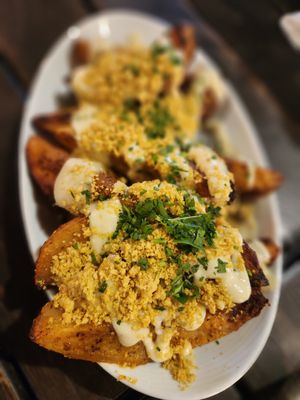 Potato wedges with garlic cashew cream at Pura Vita in West Hollywood
