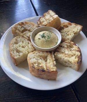 Baked cashew ricotta loved the bread   at Pura Vita in West Hollywood