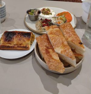 Vegan sausage rolls and 3 dips with bread. Cheaper to buy individually which is odd. at Medina in Aberystwyth