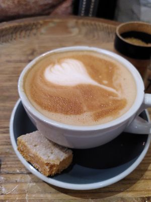 Decaf latte (shortbread not vegan - sorry) (February 2026) at Medina in Aberystwyth