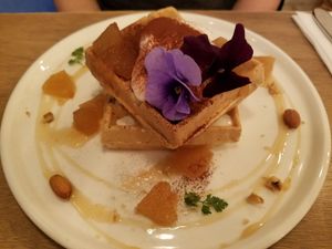 waffle with edible flowers and whipped "cream" at Botanist in Tokyo