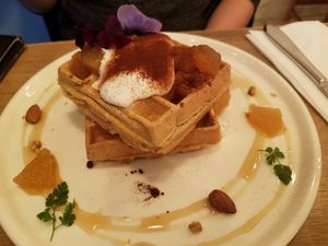 waffle with edible flowers and whipped "cream" at Botanist in Tokyo
