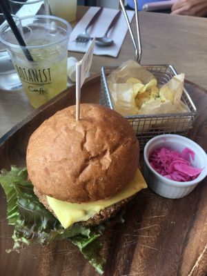 Burger and chips with a side of cold jasmine tea at Botanist in Tokyo