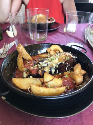 Vegan stuffed eggplant, with potatoes and amazing tomato sauce! at Geltoki in Zarautz