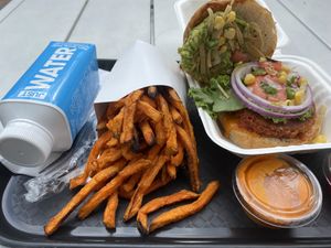 The huac burger and sweet potato fries  at Beatnic - Back Bay in Boston