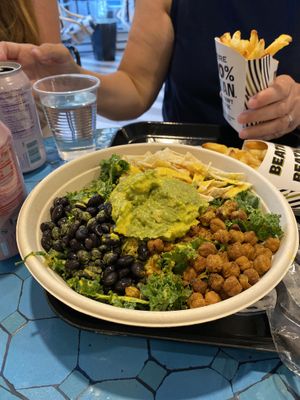 A ‘build your own’ bowl - black beans, pea guacamole, crispy chickpea, kale and quinoa…… and something else (I forget!)  at Beatnic - Back Bay in Boston