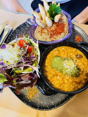 Salad, hummus, and barley risotto  at Lo de Ponxe En El Kinto Pino in Valencia