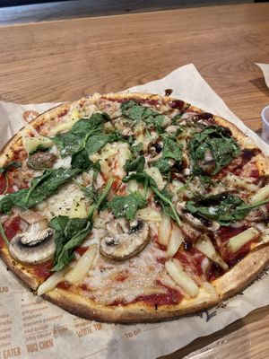 Vegan cheese with mushrooms, spinach, and pineapple   at Blaze Pizza in Burlington