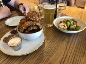 Apps: Crispy Dumplings and Puffed Quinoa Onion Rings. Fantastic!  at Fresh on Spadina in Toronto