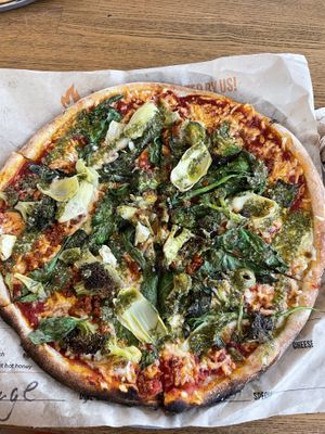 Build your own pizza with vegan cheese, soyrizo, broccoli, art hearts, and spinach   at Blaze Pizza in Kalamazoo