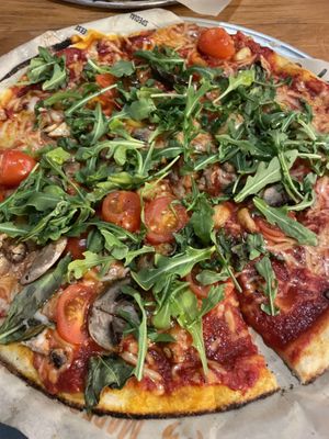 My herbivore pizza with vegan cheese- and shockingly also 2 kinds of animal carcassses  at Blaze Pizza - Mall Ring Circle in Henderson