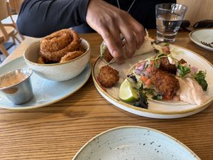Cauliflower tacos and onion rings   at Fresh Kitchen + Juice Bar in Toronto