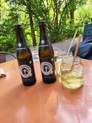 Beer and holunderblütenschorle at Café Oink in Leipzig