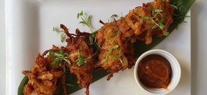 Onion buñuelos, un entrante riquisimo con salsa de papaya at La Verduleria in Tenerife